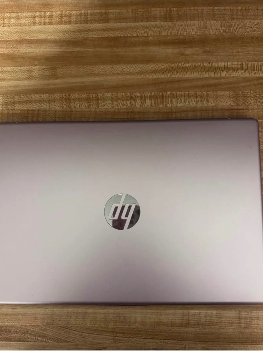 HP Silver Laptop with Purple Display Accent